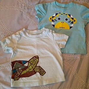2 Tea collection infant short-sleeve shirts.